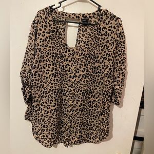 Torrid cheetah print blouse size 3